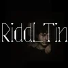Riddl_Tin