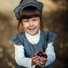 Девочка с каштанами